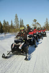 Snowmobile safari to reindeers in Kuusamo