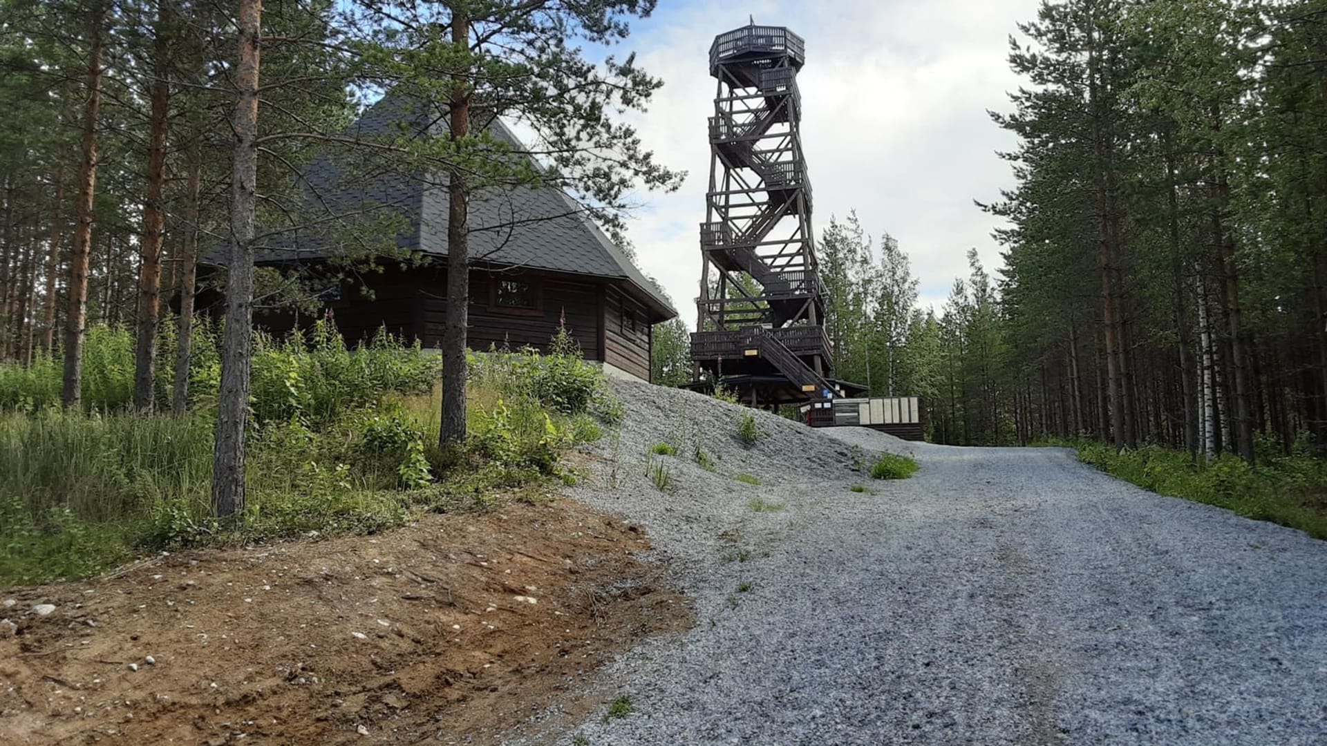 A wooden observation tower and a hut