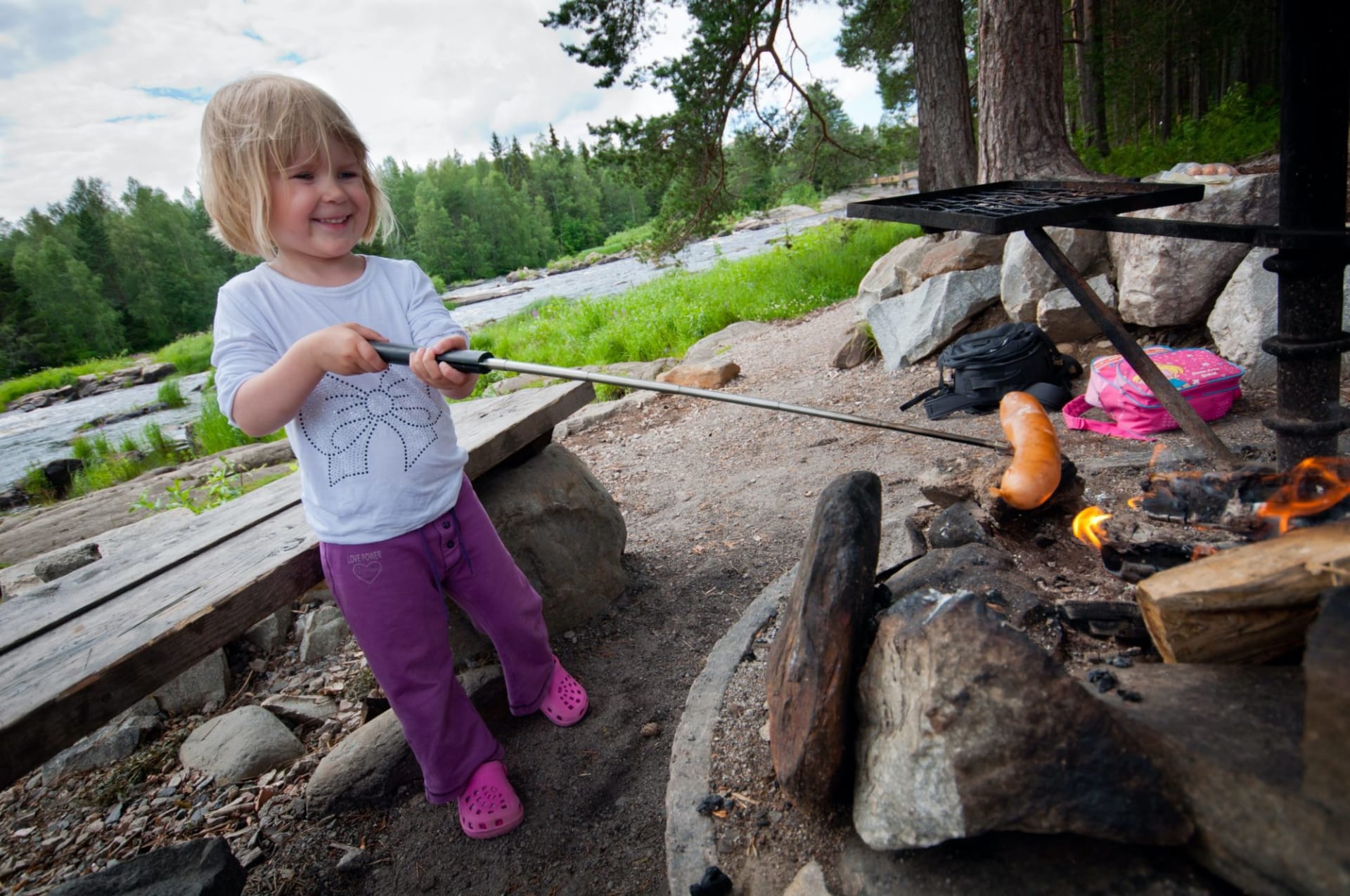 Campfire and kid.