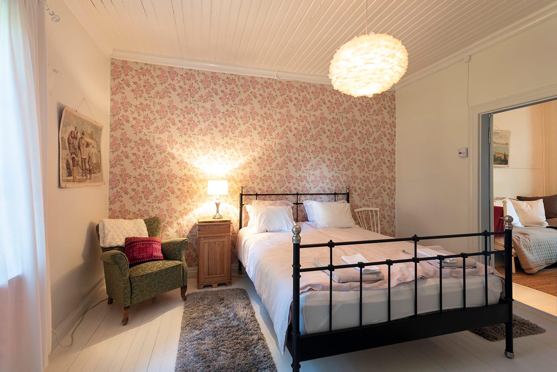 Bedroom with romantic flower wall. 