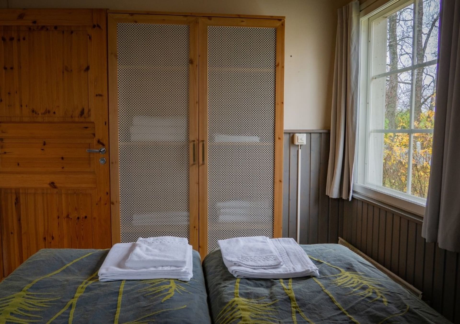 Bigger cottages have one separate bedroom with two twin beds.