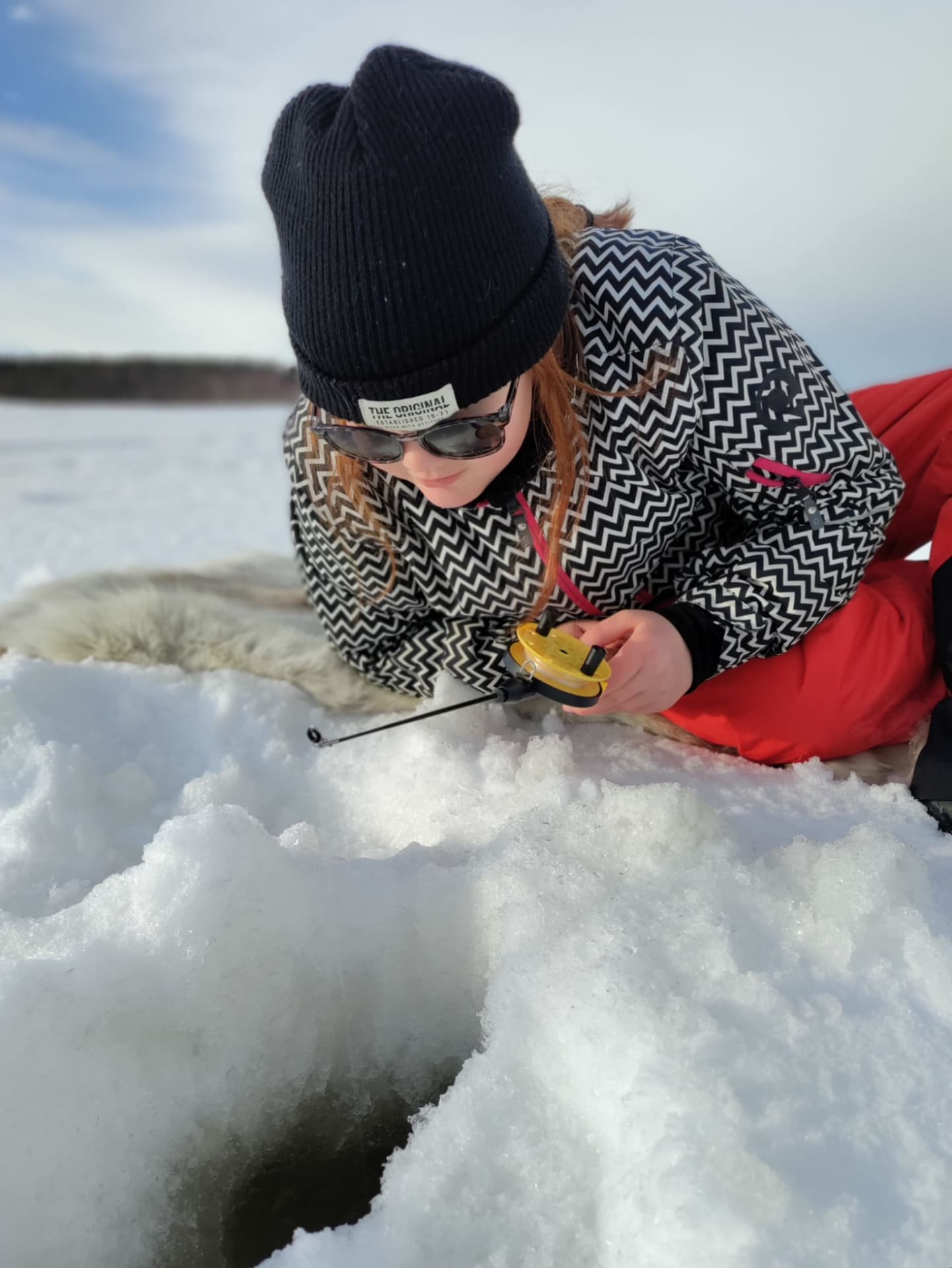 Ice fishing at Bothnian bay