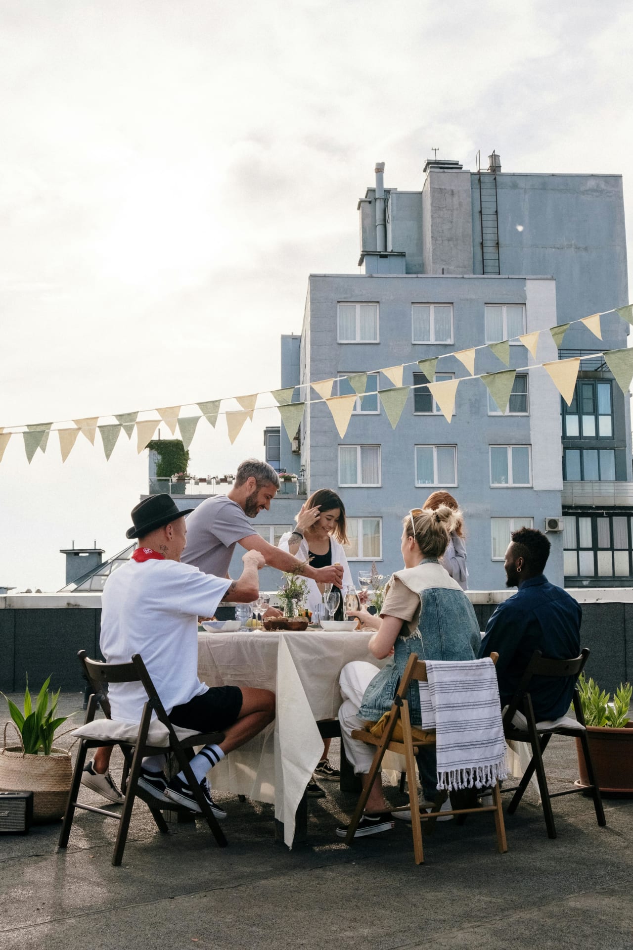 People having dinner party outside