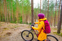 The cyclist in a ridge landscape