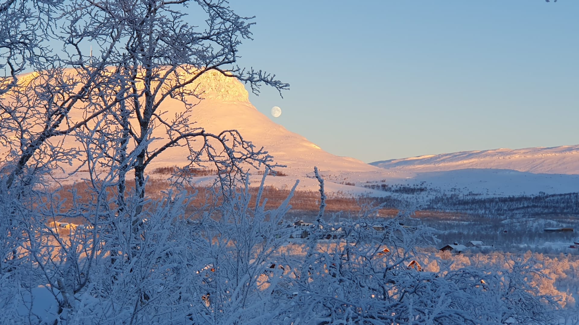 Mt. Saana viewed from the village edge during the scenic snowmobile ride
