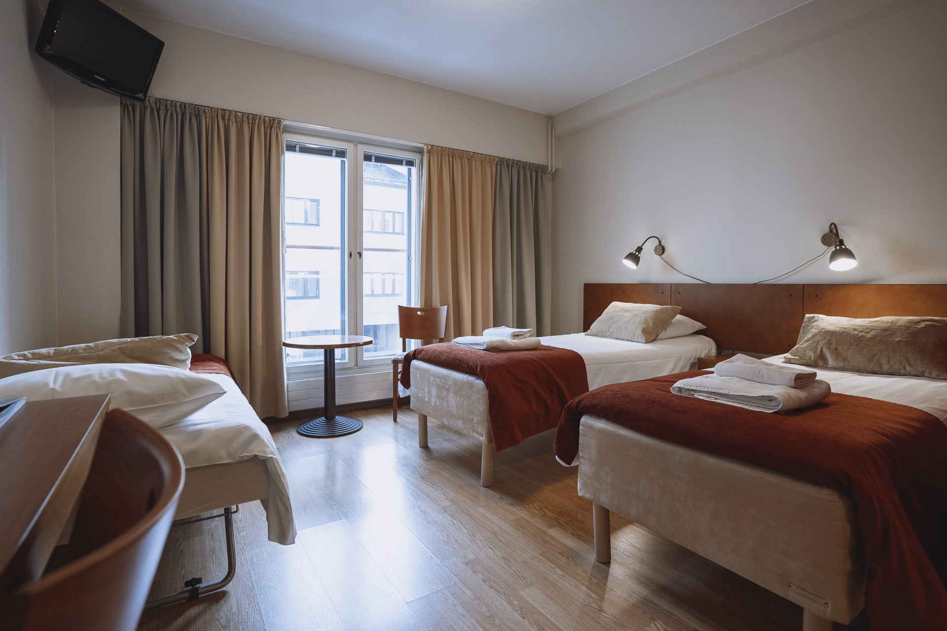 Room for three: separate beds.