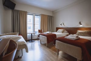 Room for three: separate beds.