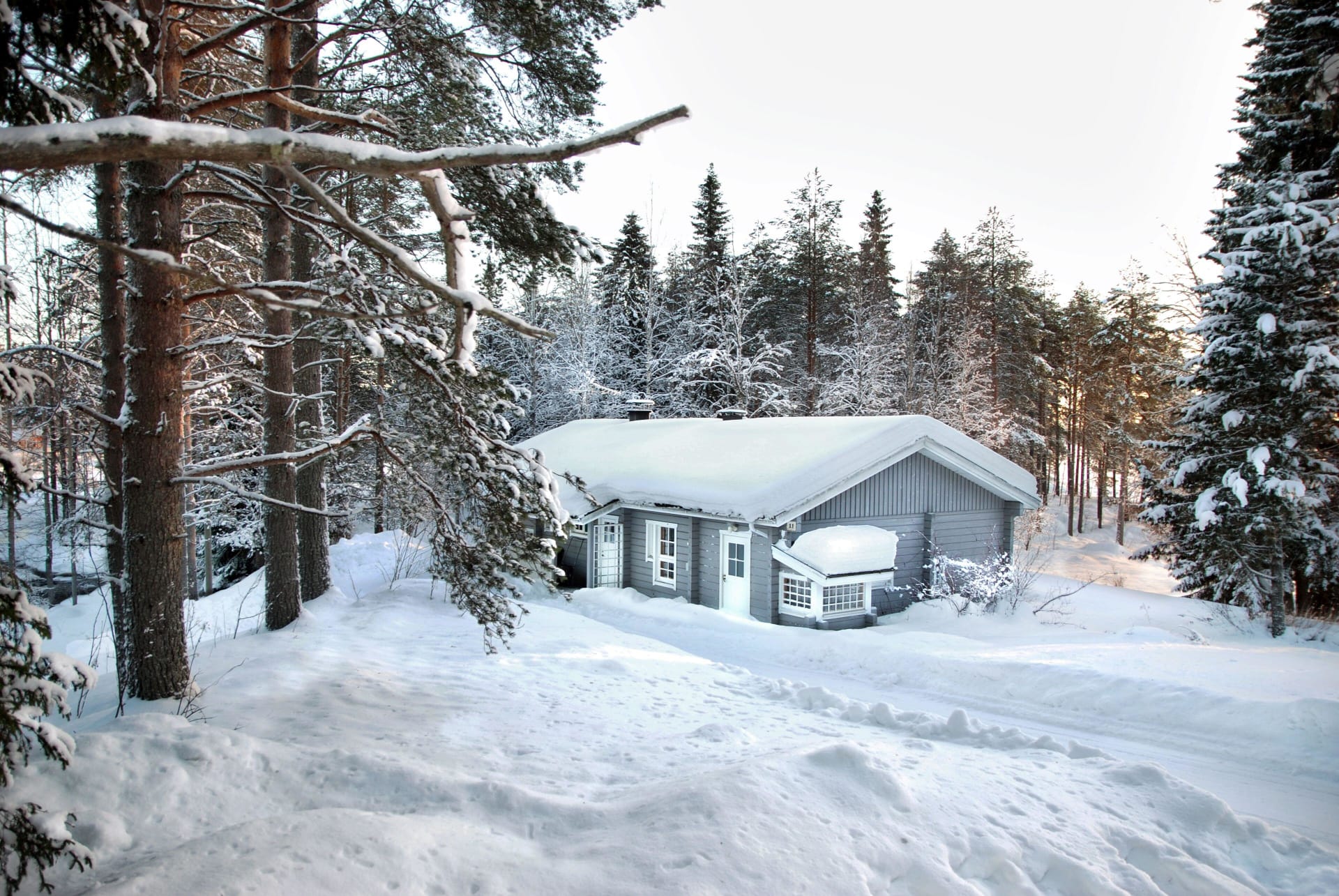 Snowy softness of Hiisi Lodge winter.