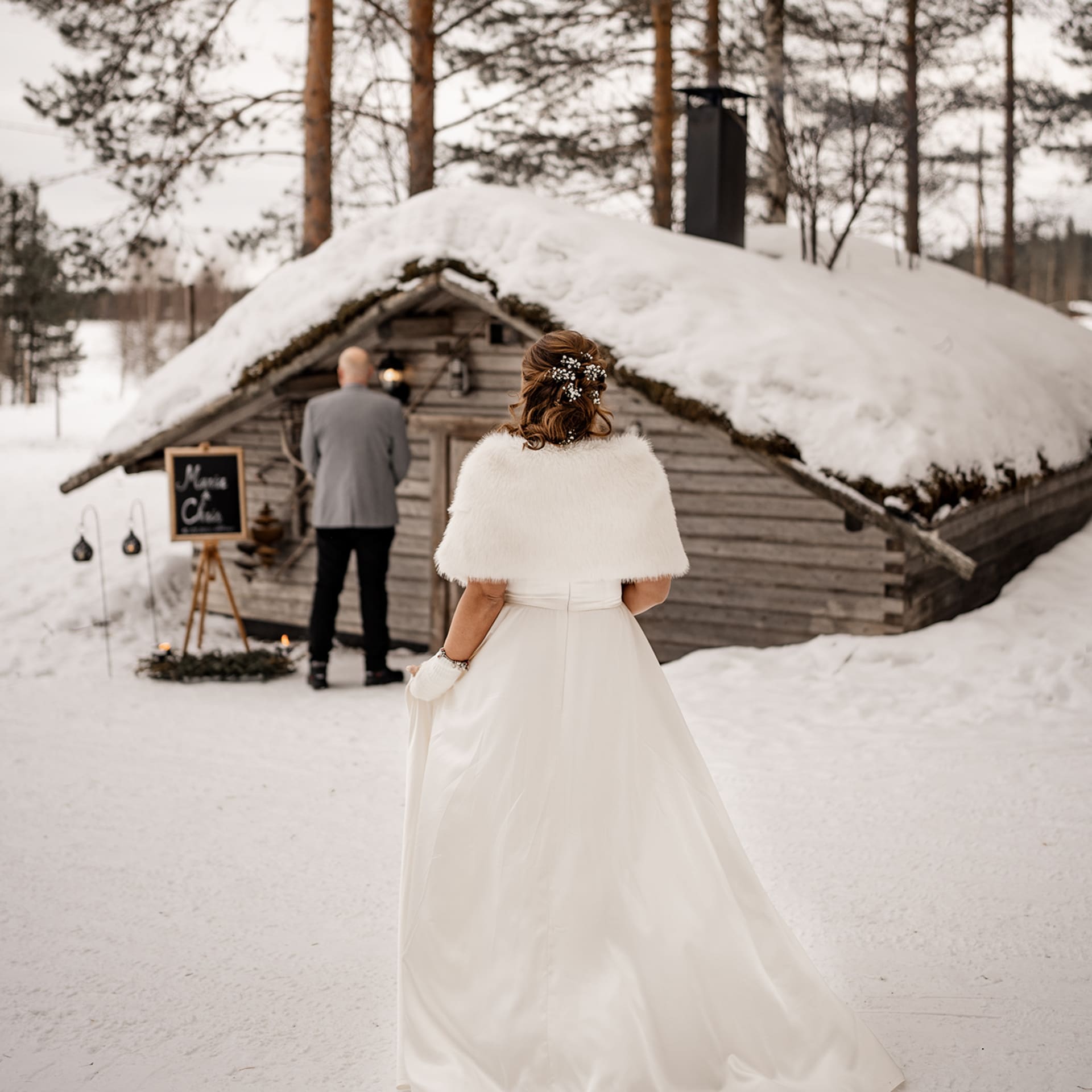 Wedding ceremony in the small cottage in the reindeer farm