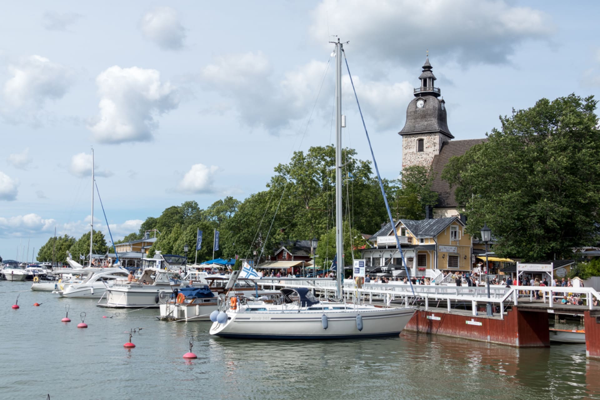 Naantali church and guest harbour boats Naantali church and guest harbour boats