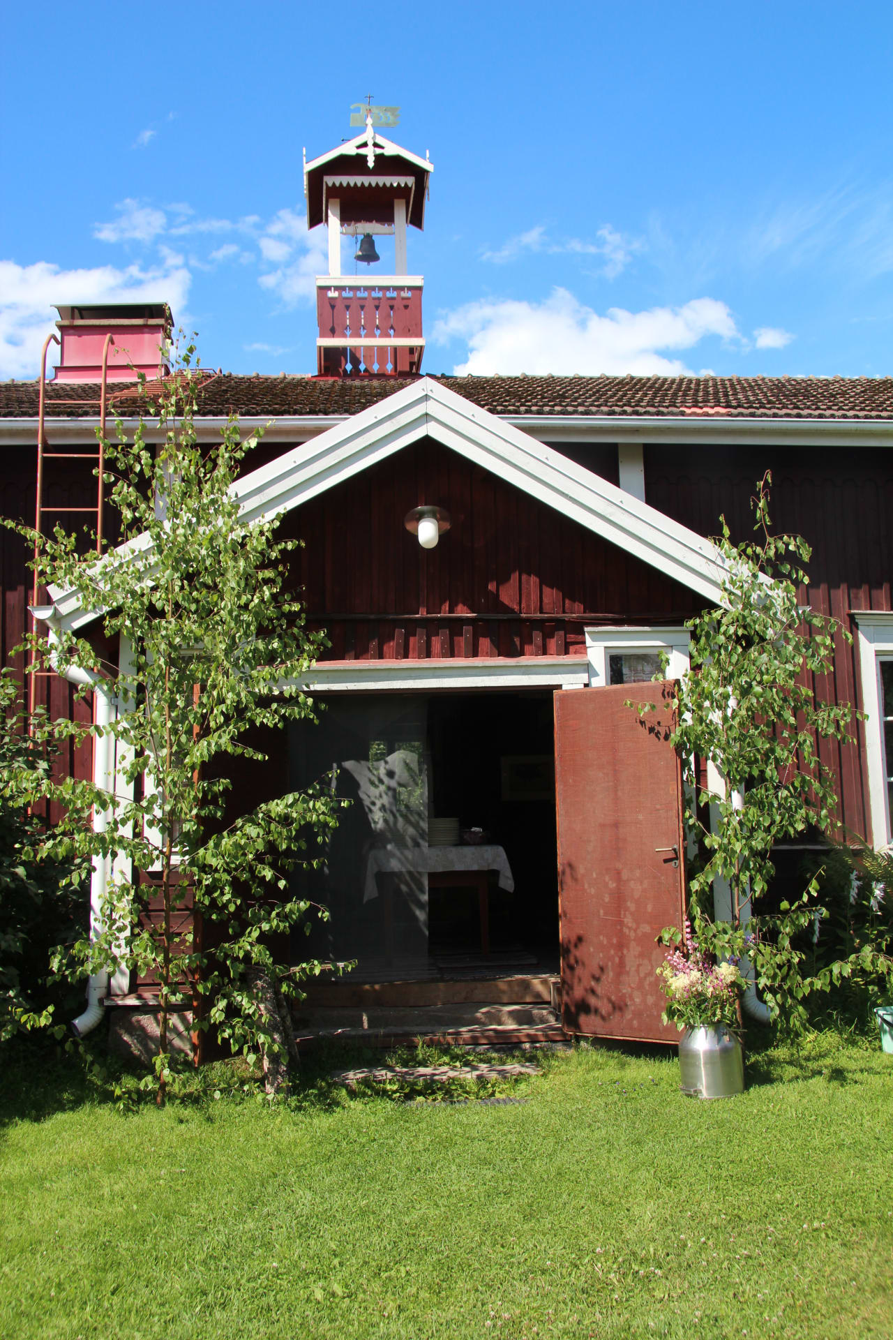 Old Side Building, porch with midsummer birches