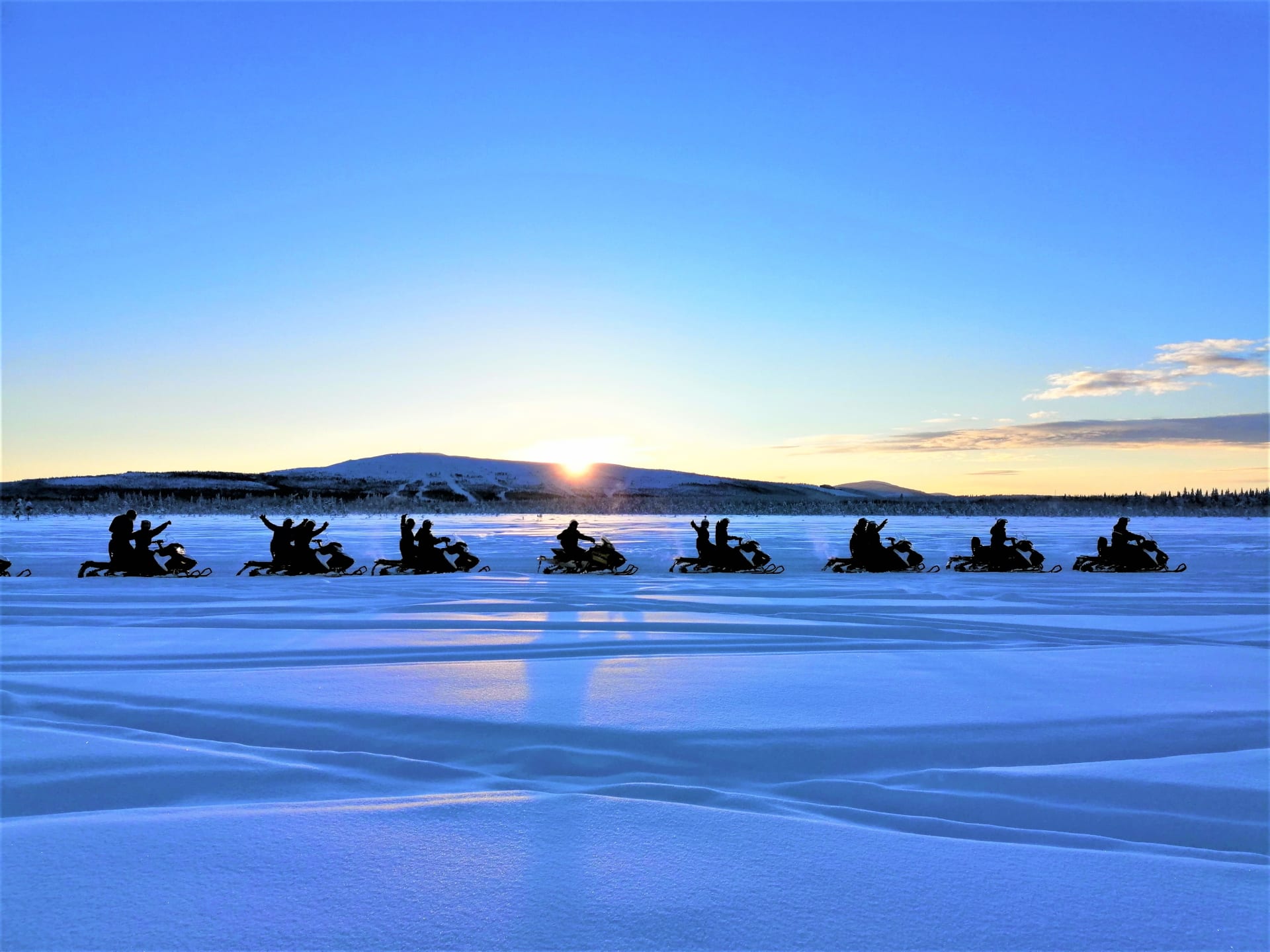 Lapp tent safari by snowmobile