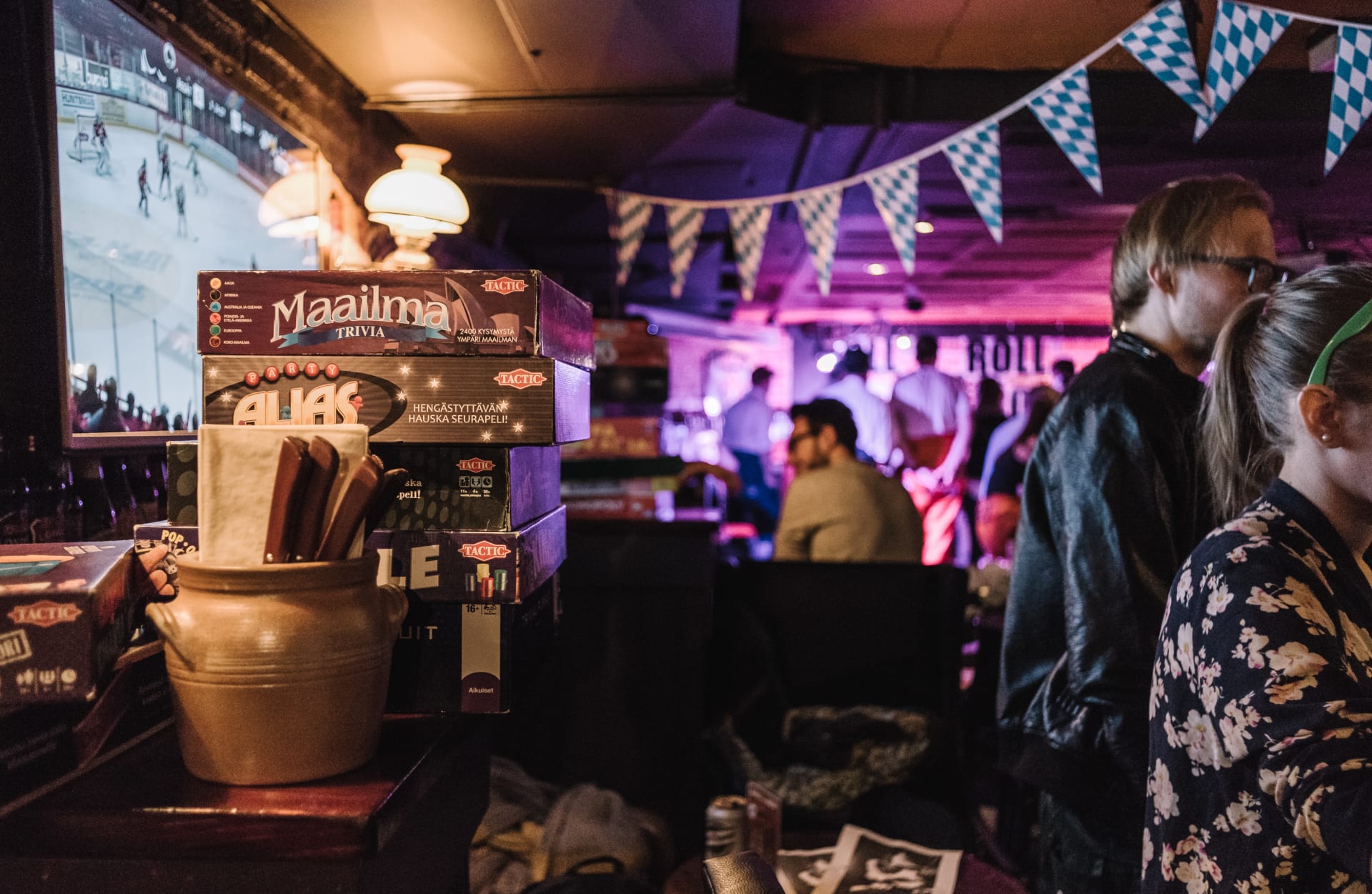 Board games and people in a bar