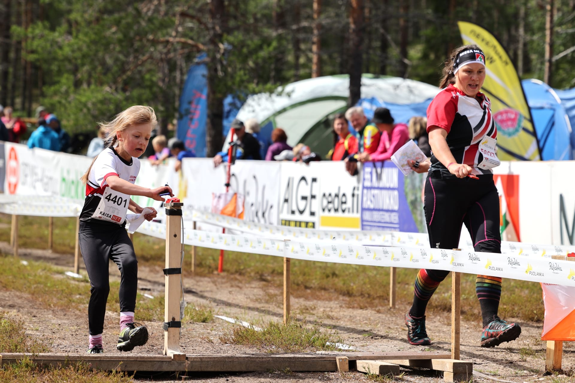 Young orienteer at the finishline of Kainuu O Week