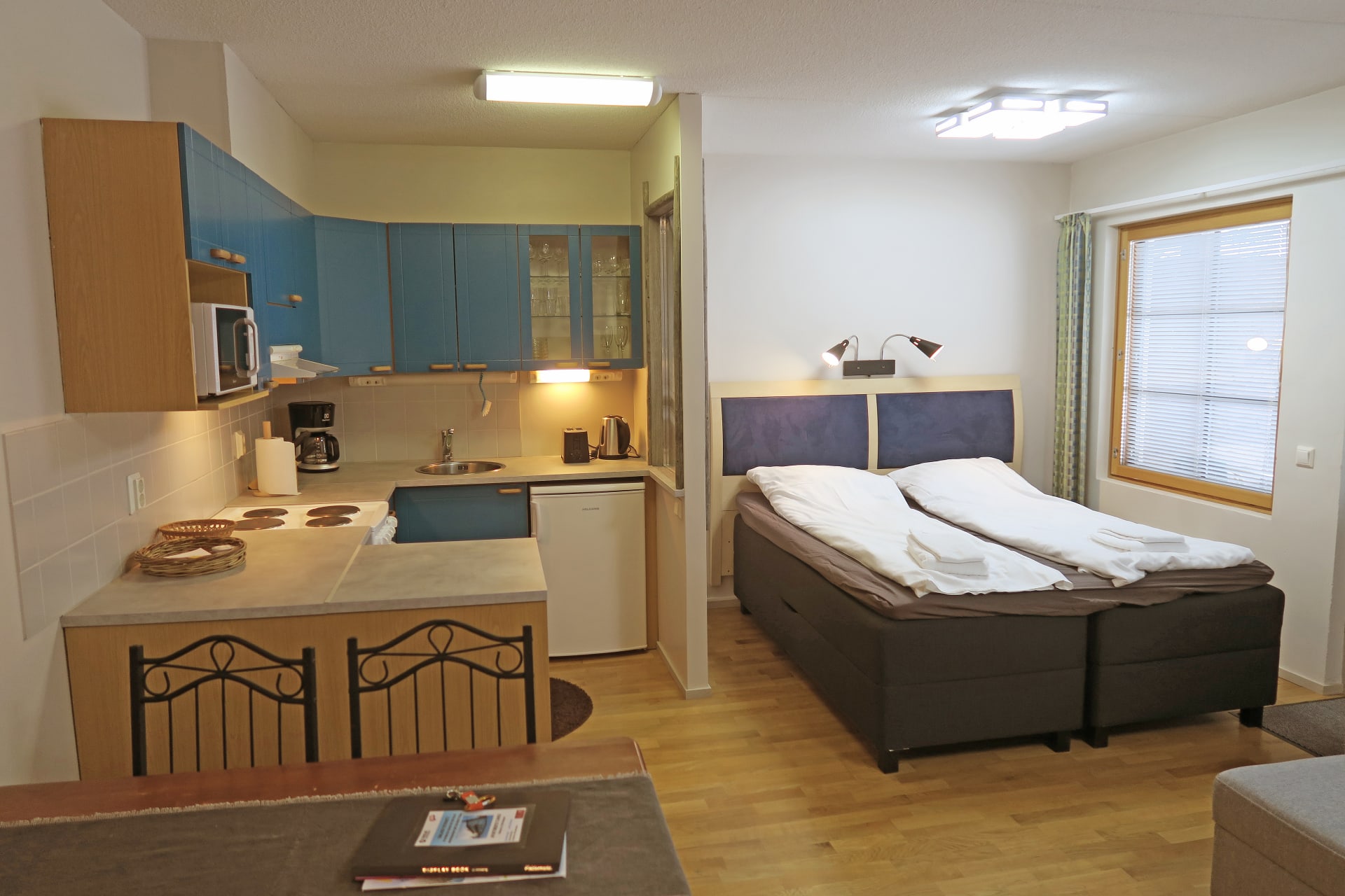 Dining and bed in a studio apartment