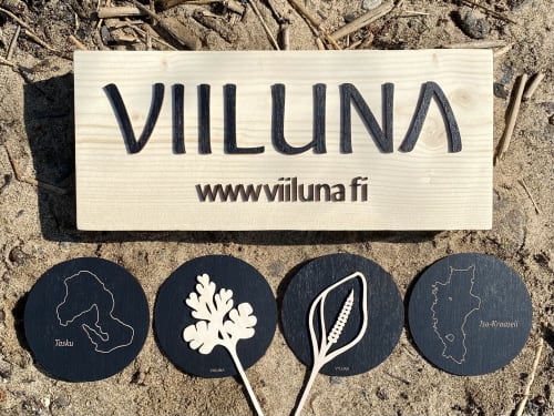 Viiluna produces laser-cut and engraved design products from Finnish birch plywood.