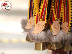 Local handicraft reindeer bells in Santa Claus Office Shop.