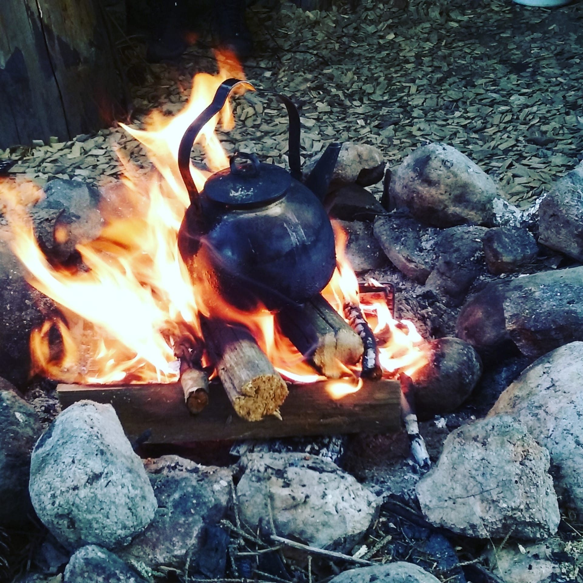 Coffee by open fire