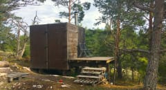 "Hot Cube" is located on a rock.