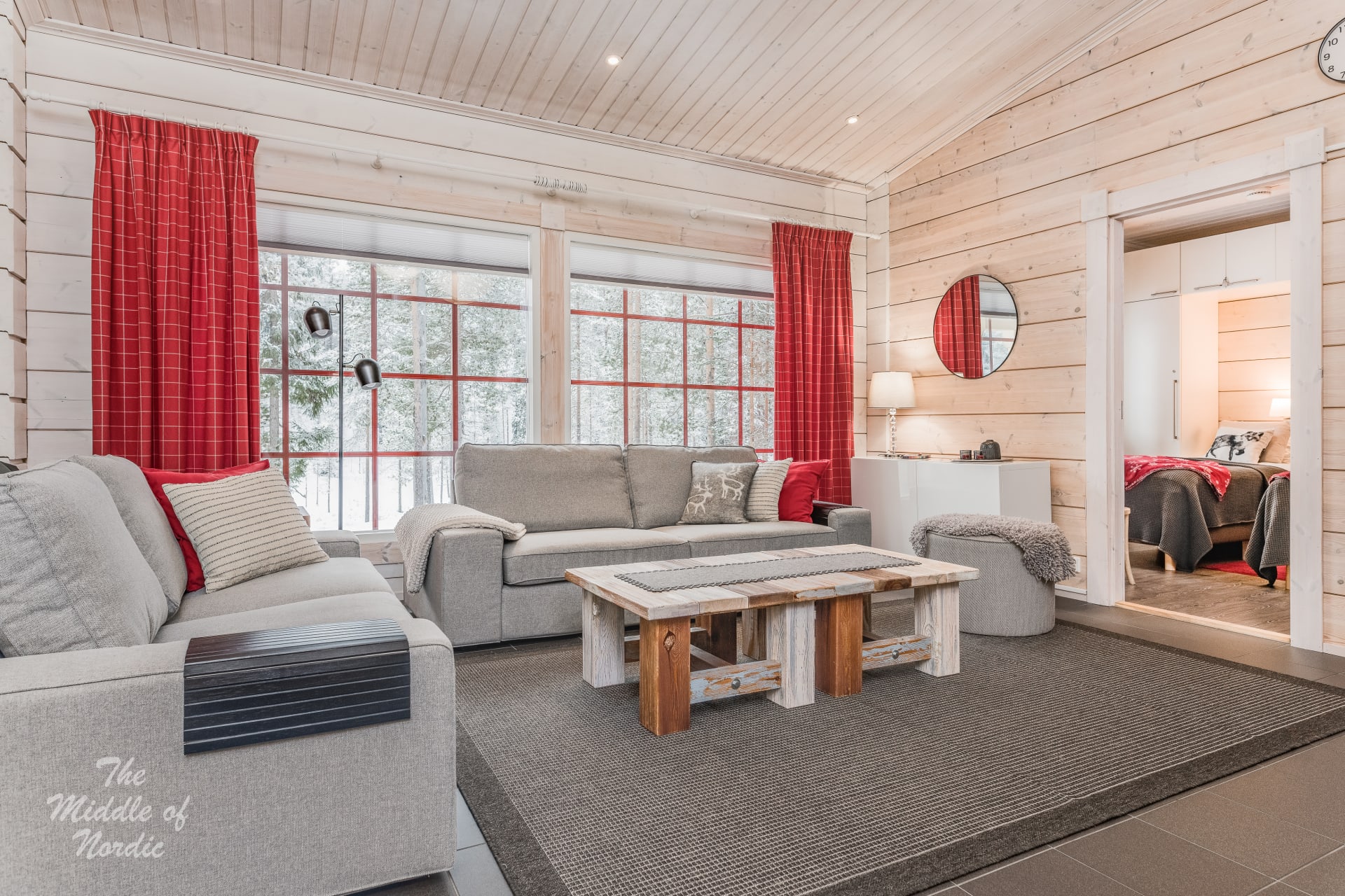 You can enjoy the warmth of the fireplace in your own living room, which has two- and three-seat sofas and a smart TV.