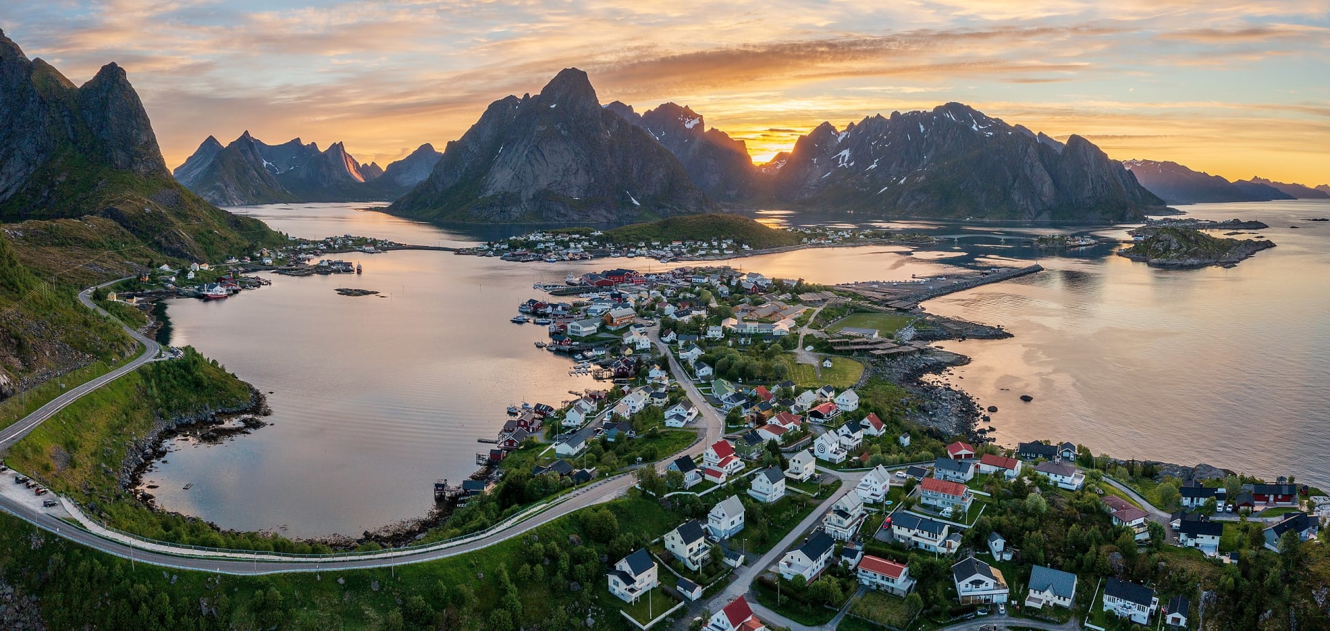 "A late night summer view over the village Reine and Reinefjorden in Moskenes, Nordland, Norway in 2022 June"