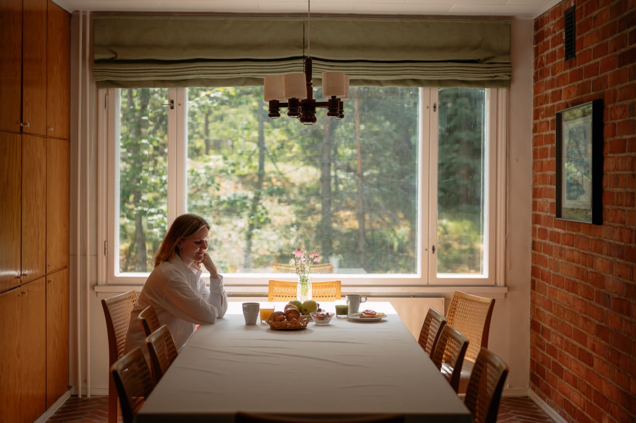 Dining room window is towards the woods.