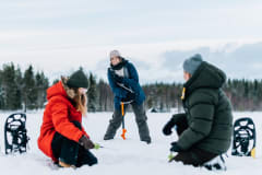 Ice Fishing at Arctic SnowHotel & Glass Igloos