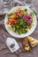 A delicious portion of salad on a plate.