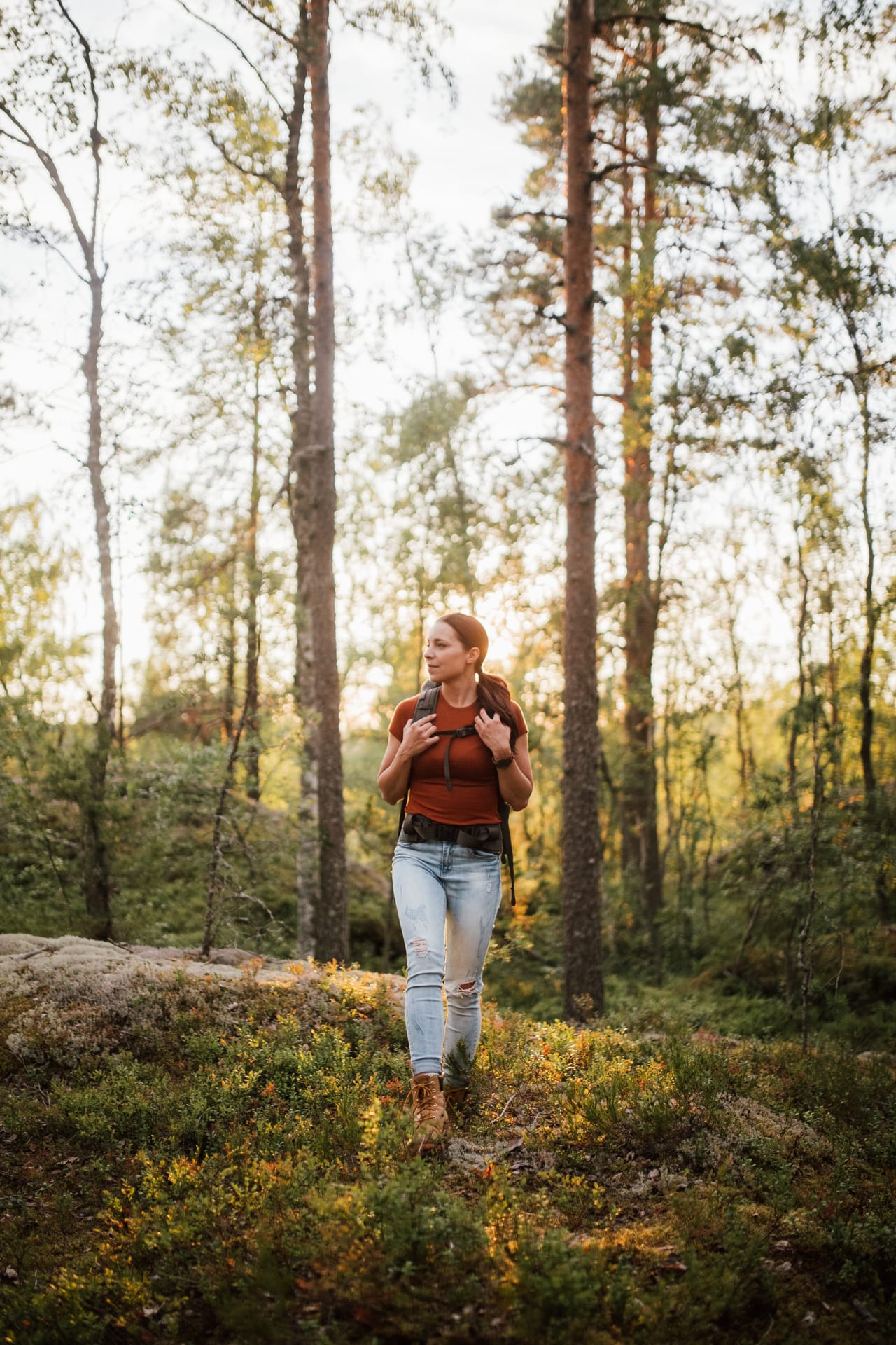 Woman hiking on Metso wellness trail 