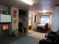 The cottage features a kitchen and living area.