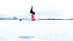 Snow Yoga and head stand.