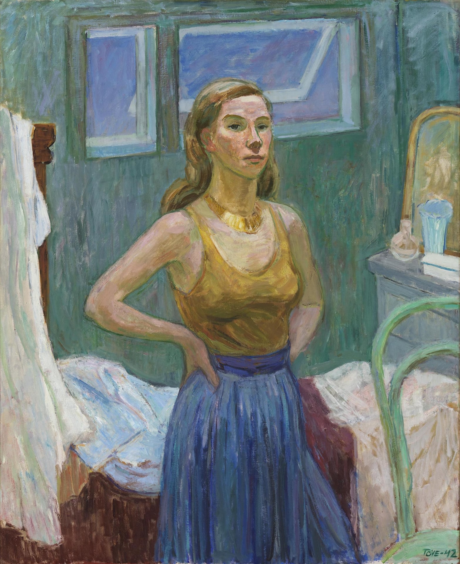 A woman wearing a sleeveless shirt and a skirt. A bed, a dressing table and an open window in the background.