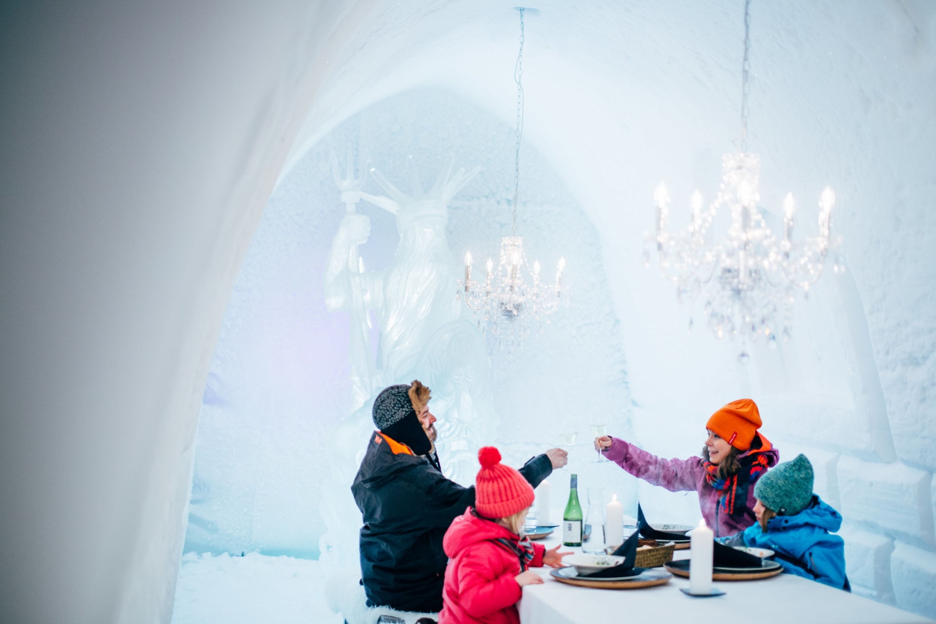 Family having lunch in Snow restaurant in Snowman World.