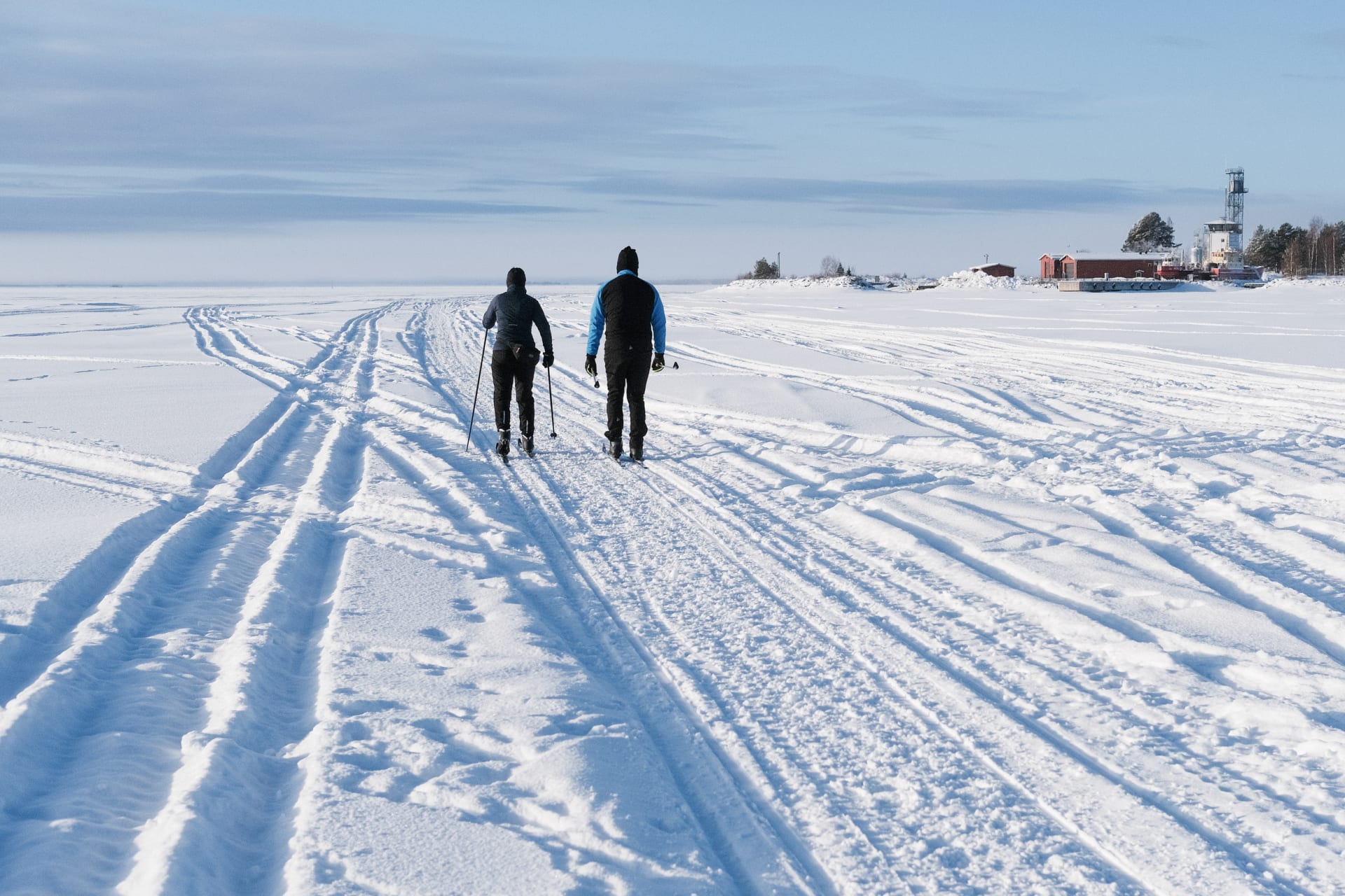 Skiers on sea ice.