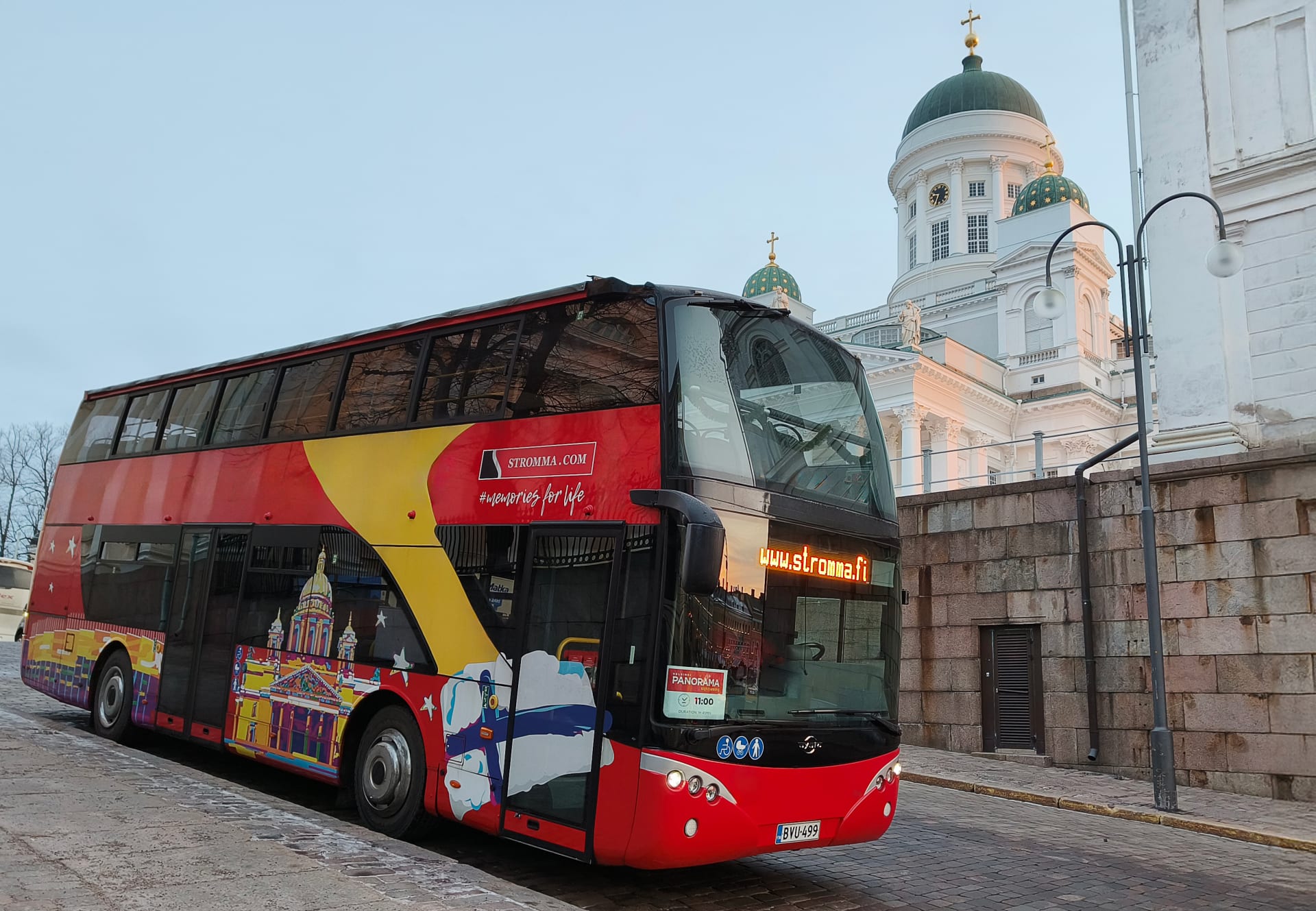 Double decker bus at Senate Square, by the Helsinki Cathedral