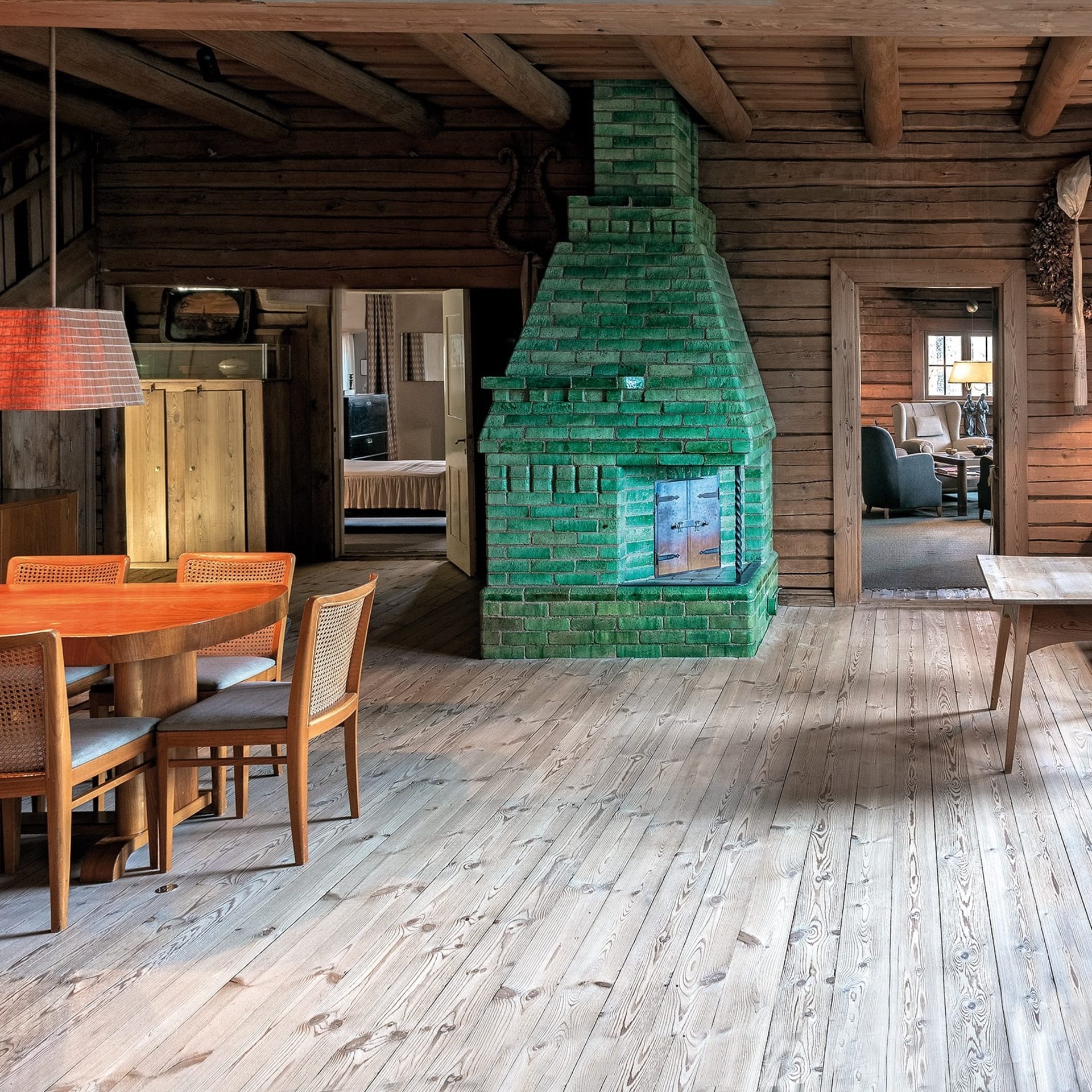 The green fireplace in the diningroom of Ainola, Aino and Jean Sibelius Home.