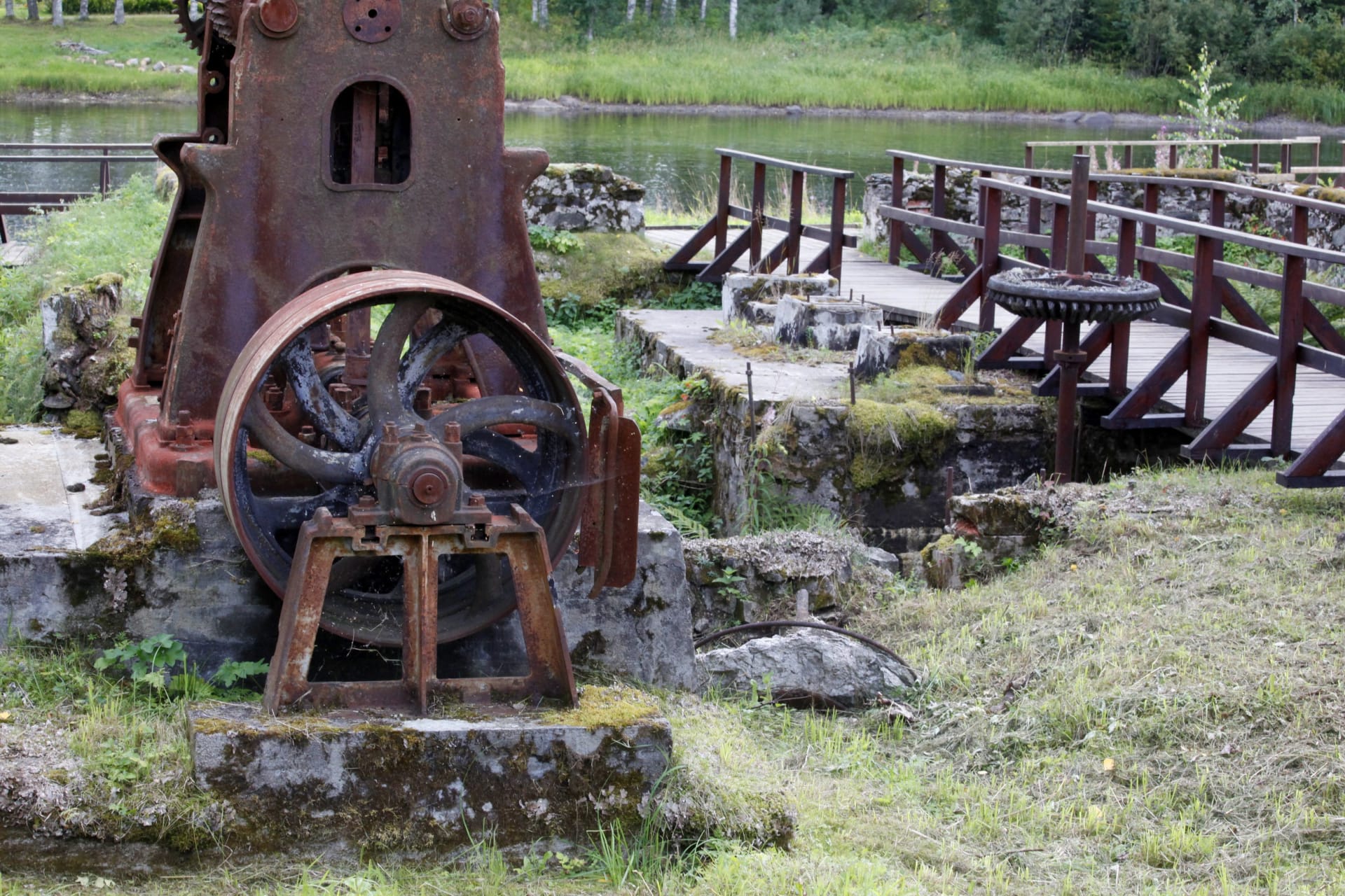 Ruins of the old sawmill standing by the surge of Möhkönkoski rapids