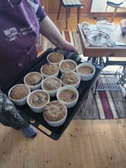 Pies are taken from the oven.