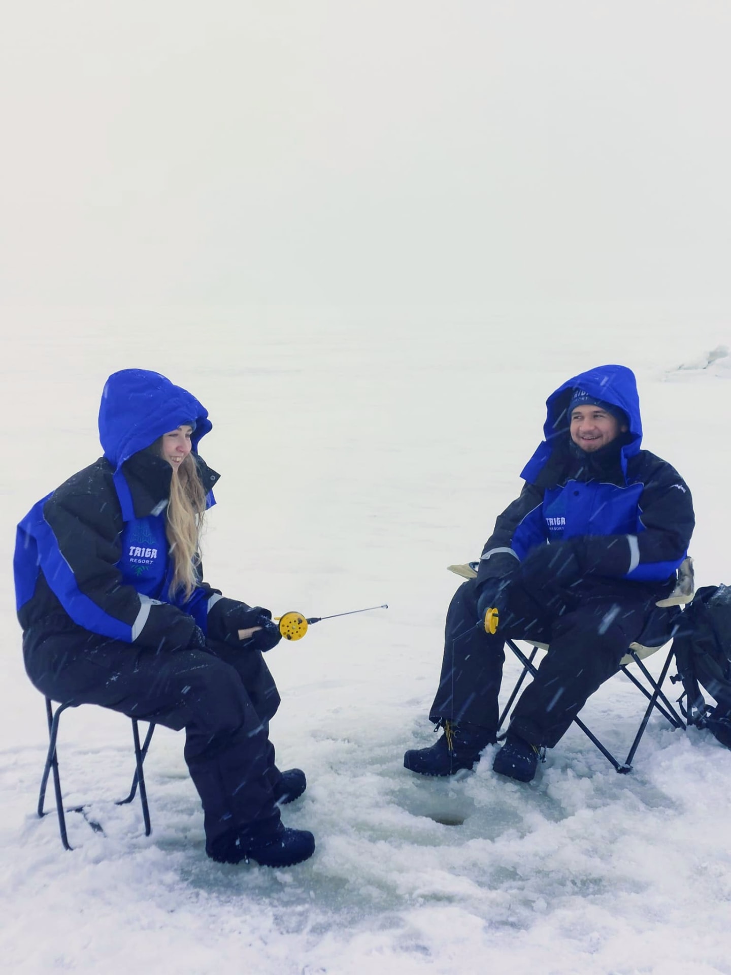 Ice fishing on the frozen sea