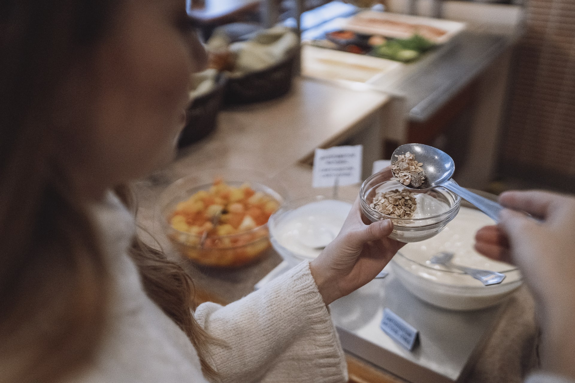 A person taking breakfast in a buffet.  A person taking breakfast in a buffet.
