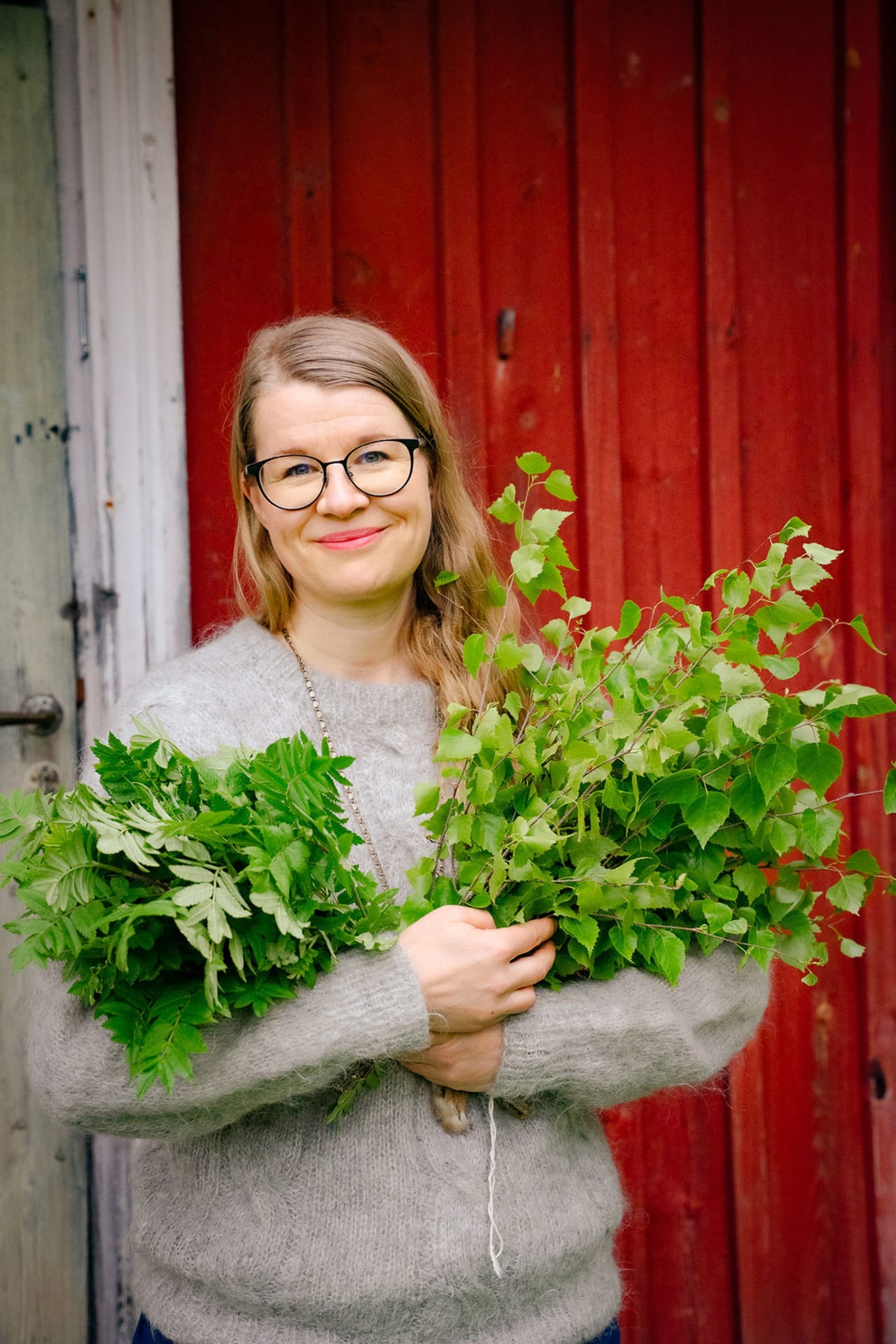 Sauna healer with her vihtas