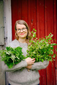 Sauna healer with her vihtas
