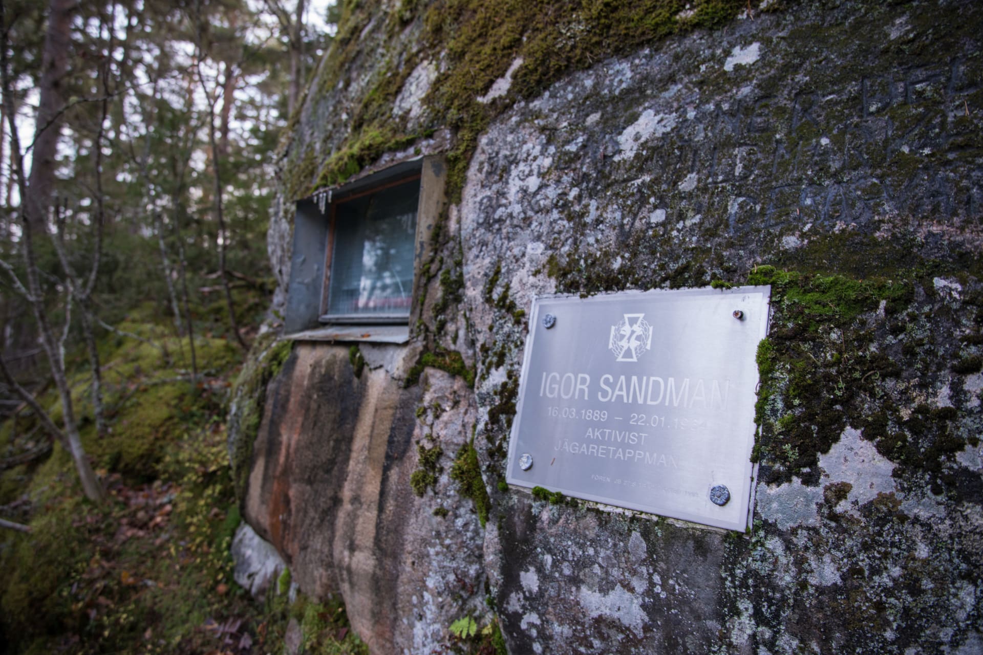 The miniature ship, Equity, and a memorial plaque honoring local smuggler and activist Igor Sandman.