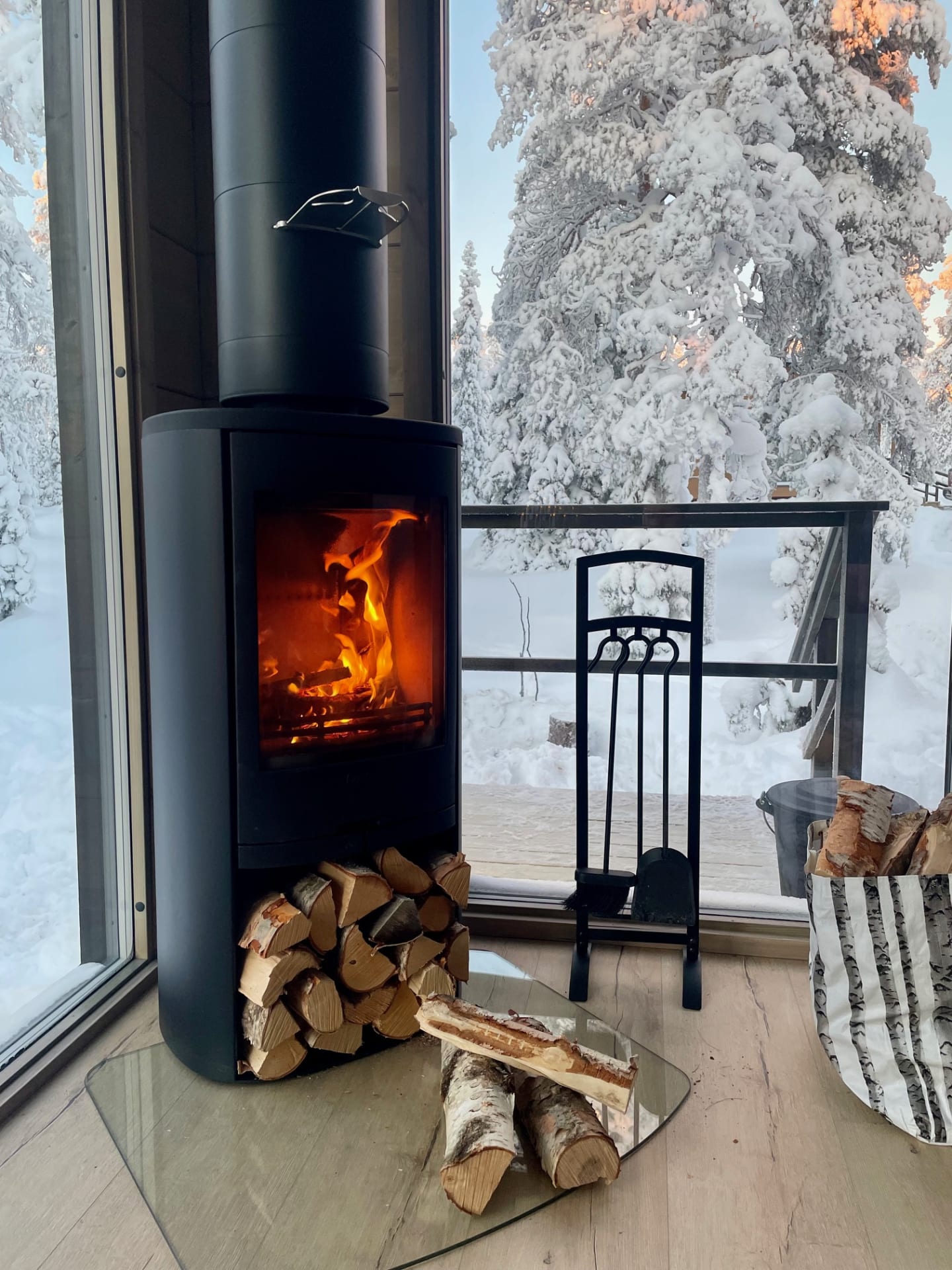 WALD Villas fire place and big windows.