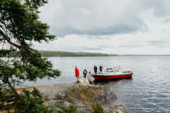 People entering the island from the boat.