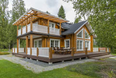 High quality villa by a lake with terraces facing the lake.