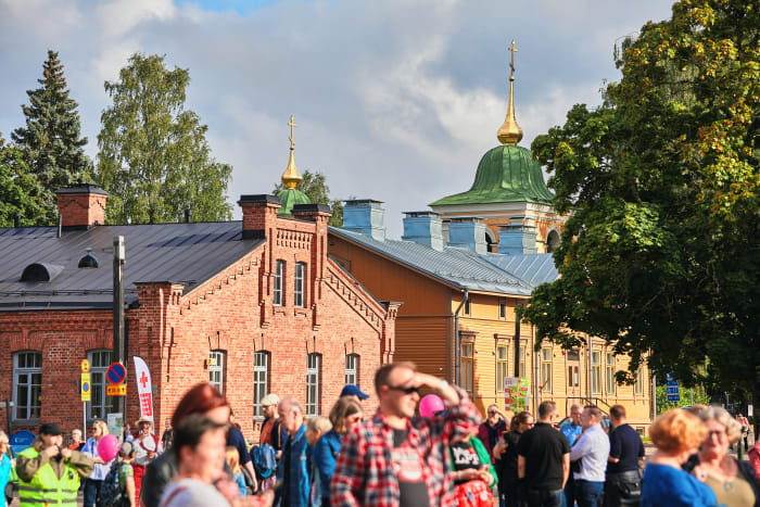 Red brick building and orthodox church