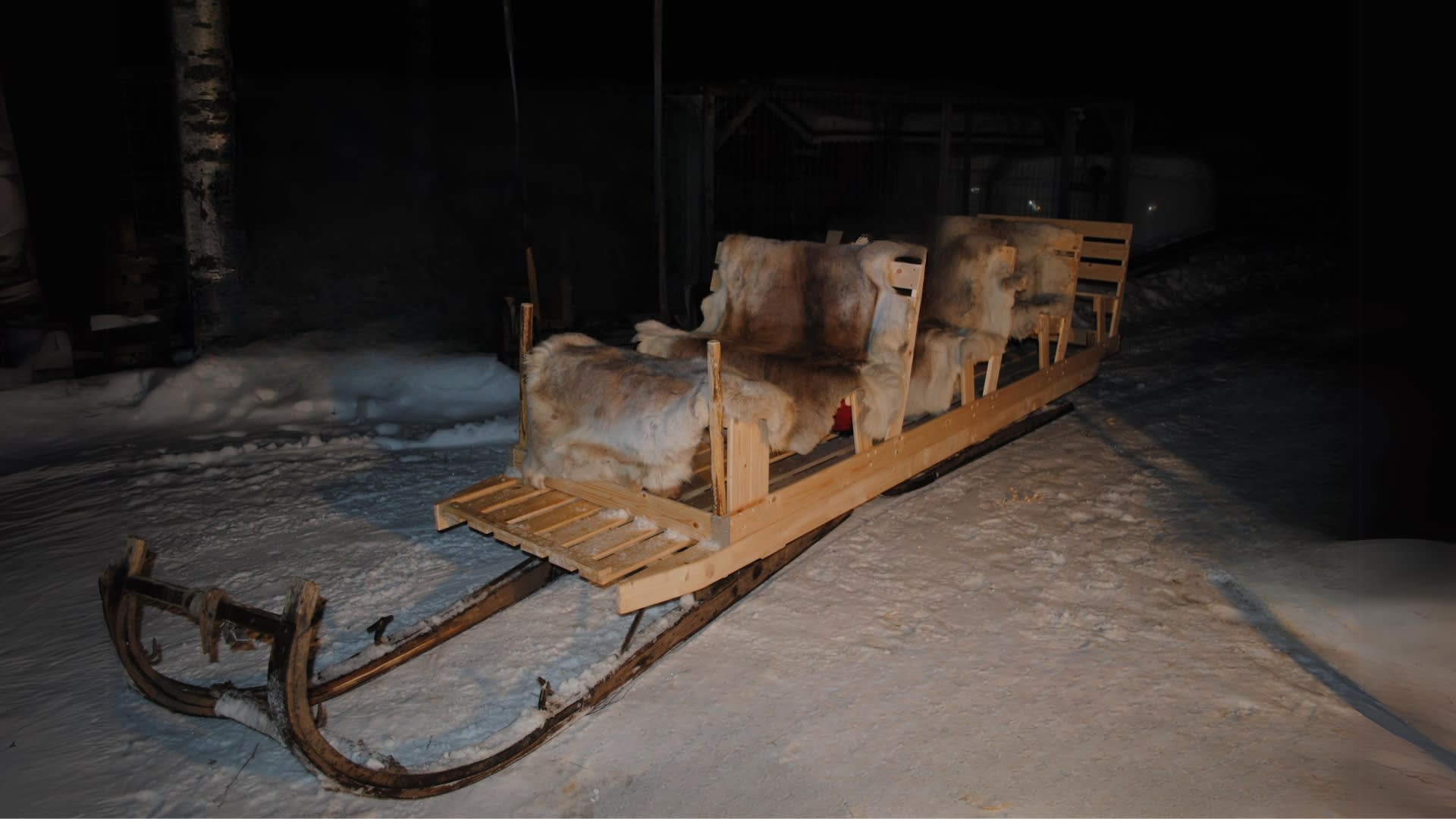 Sleigh ride on a snowmobile-drawn sleigh