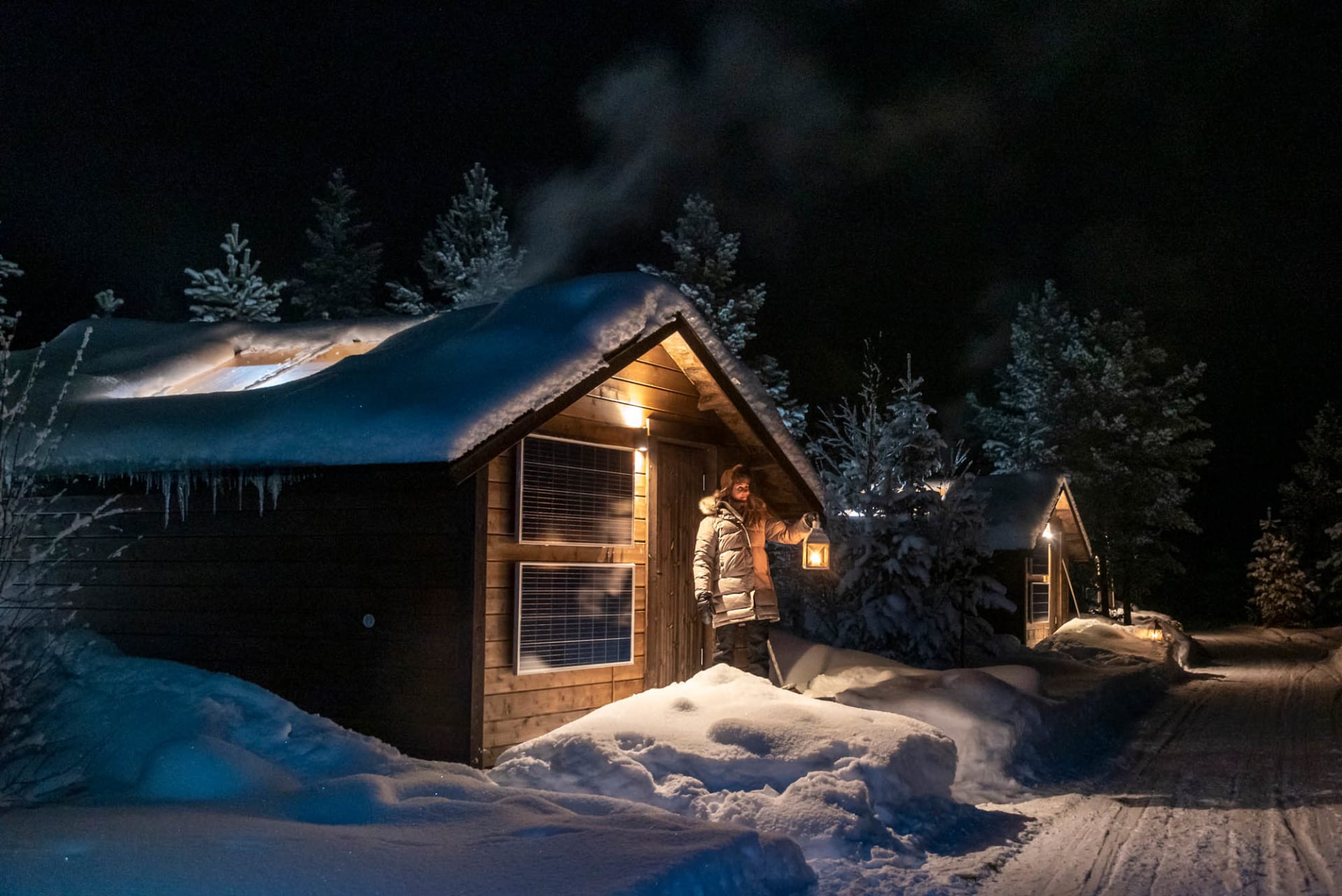 Aurora Wilderness Cabin at night during 2-day husky safari