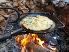 Nettle pancakes by the fire